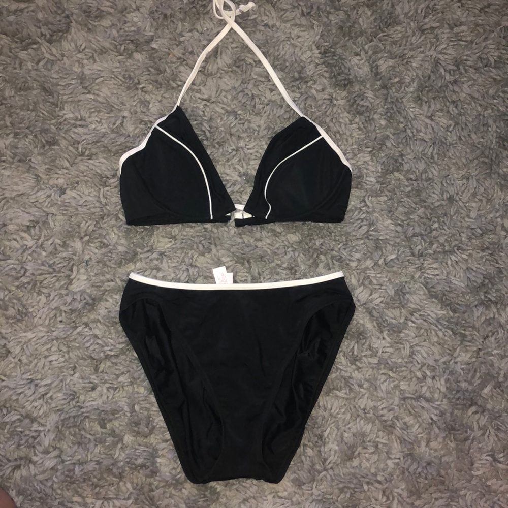 VS bikini plus a skirt